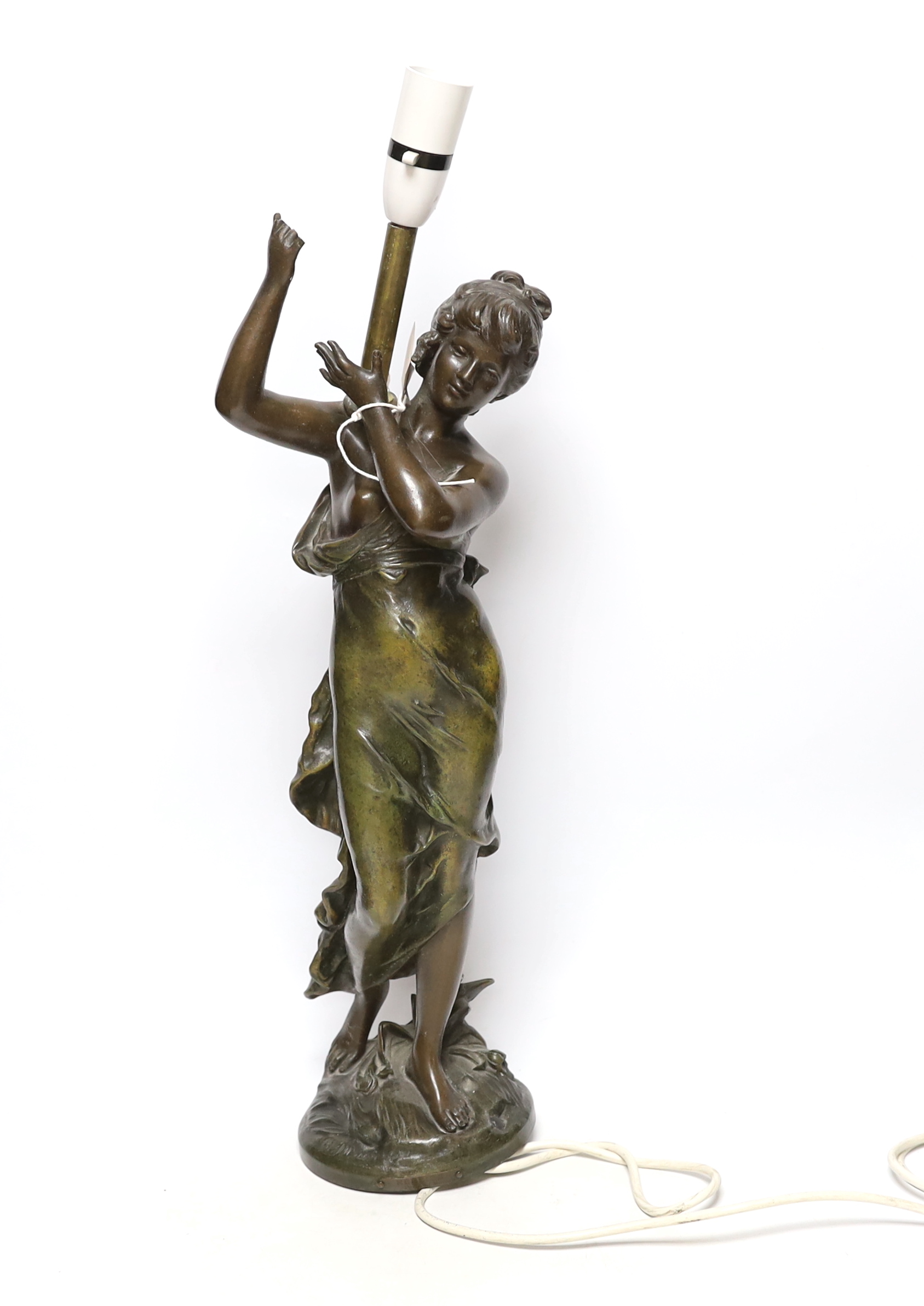 After Auguste Moreau (1834-1917) an Art Nouveau style spelter figural table lamp, applied plaque, 53cm high